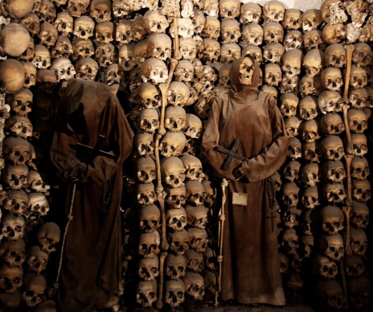 Bone Crypts & S. Clemente ENGLISH tour - tickets included - The quick cab to the Colosseum zone: keeping momentum