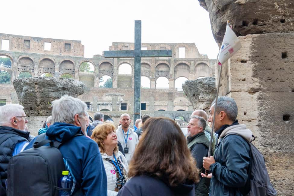 Colosseum Guided Tour: Hotel Transport included - Entering the Colosseum: first and second levels with headsets