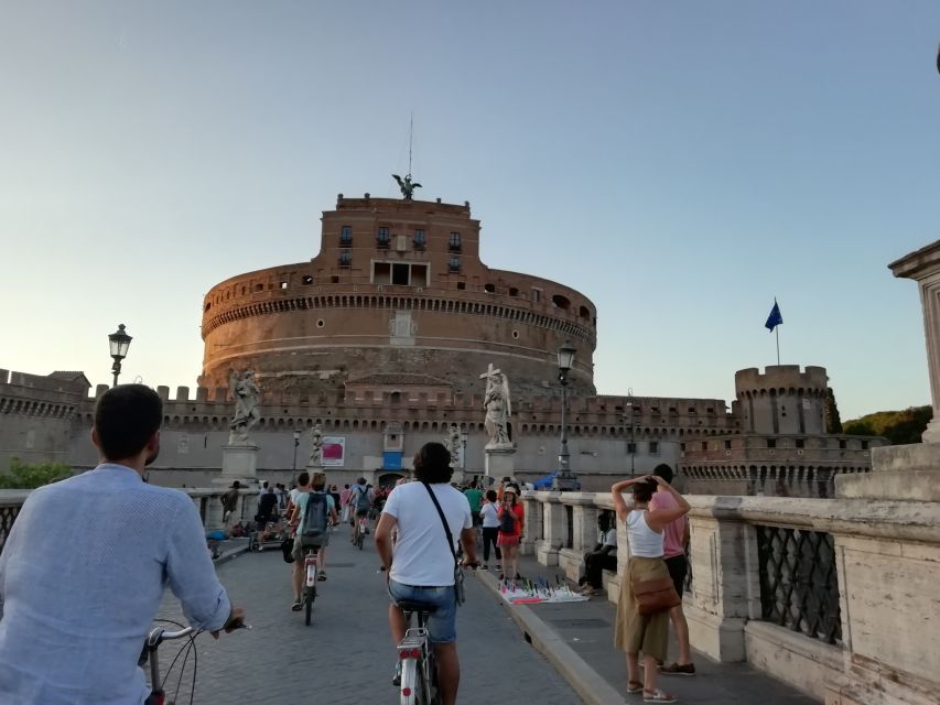 Rome at Night Bike Tour - Rolling along the Tiber: wine, sunset light, and a calmer kind of sightseeing