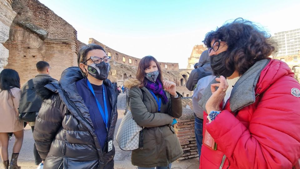 Rome: Colosseum Arena and Ancient Rome Guided Tour - Roman Forum Walk: Government Ruins, Market Corners, and Temples