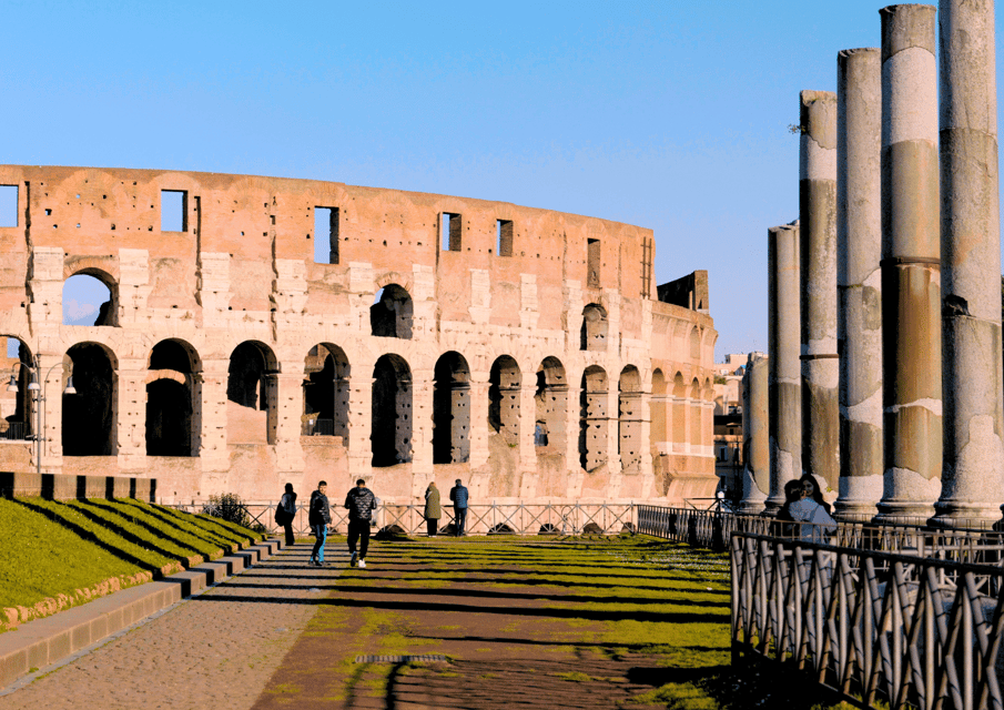 Rome: Colosseum Arena & Roman Forum Small Group Tour - Entering the Colosseum with express security